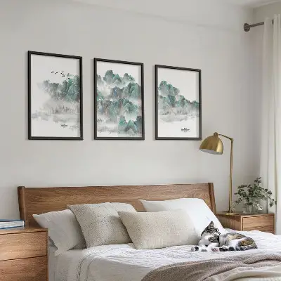 Three-piece wall art set featuring mountains, clouds, birds, and a boat in a Japandi style