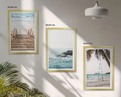 Set of 3 framed wall art pieces featuring a seaside staircase with a swing
