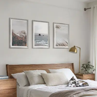 Three-piece wall art set featuring mountains, clouds, sea, and sand nature landscape