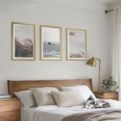 Three-piece wall art set featuring mountains, clouds, sea, and sand nature landscape