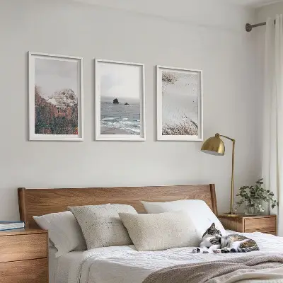 Three-piece wall art set featuring mountains, clouds, sea, and sand nature landscape