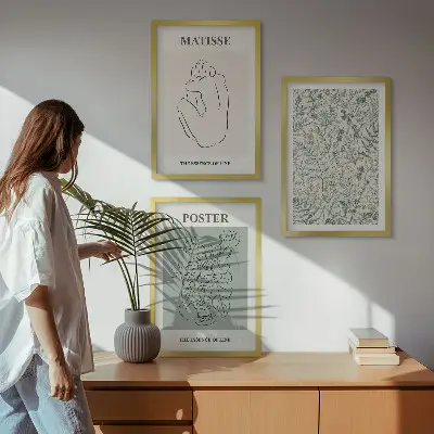 Three-piece wall art set with minimalist plant line patterns