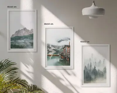Set of 3 framed wall art pieces featuring mountains, a lake, a cottage, and fog