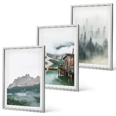 Set of 3 framed wall art pieces featuring mountains, a lake, a cottage, and fog