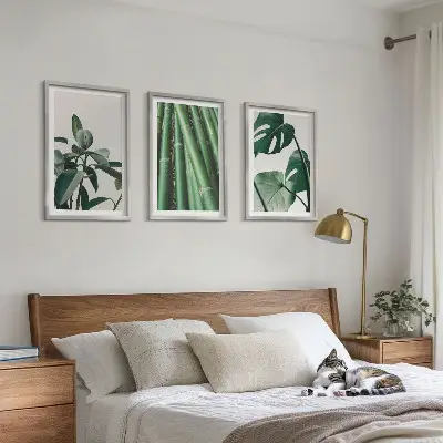 Bamboo stems and monstera leaves wall art set of 3 framed pieces
