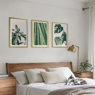 Bamboo stems and monstera leaves wall art set of 3 framed pieces