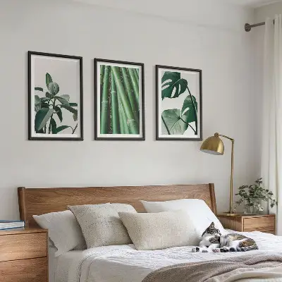 Bamboo stems and monstera leaves wall art set of 3 framed pieces