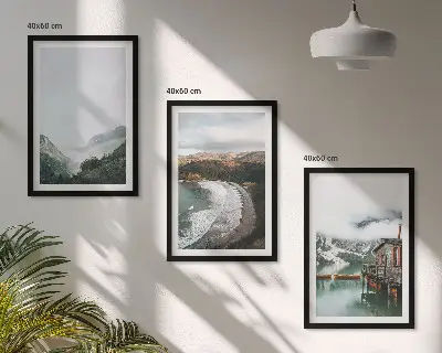 Set of 3 framed wall art pieces featuring mountains, beach, clouds, and water