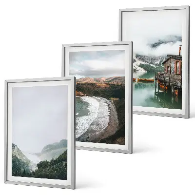 Set of 3 framed wall art pieces featuring mountains, beach, clouds, and water