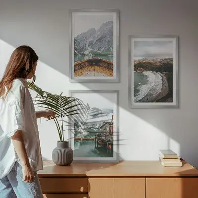Three-piece mountain and lake landscape wall art featuring a boat on a beach