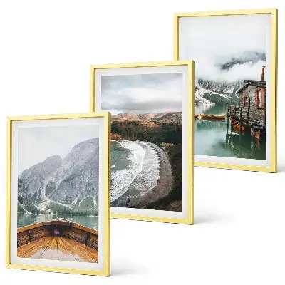 Three-piece mountain and lake landscape wall art featuring a boat on a beach