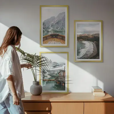 Three-piece mountain and lake landscape wall art featuring a boat on a beach