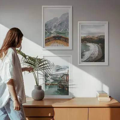 Three-piece mountain and lake landscape wall art featuring a boat on a beach