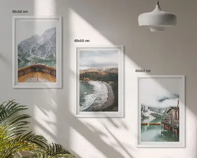 Three-piece mountain and lake landscape wall art featuring a boat on a beach