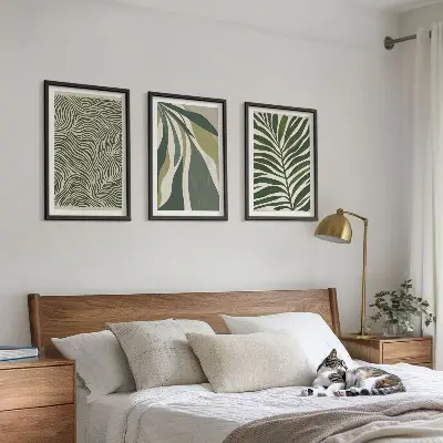 Wall art set with green leaves and wavy lines