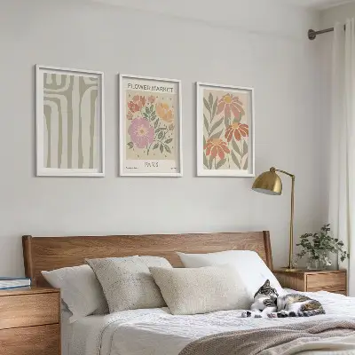 Set of 3 framed wall art pieces with botanical motifs in a Parisian minimalist style