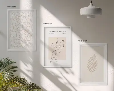 Three-piece wall art set with minimalist botanical motifs