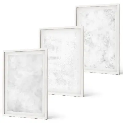 Set of 3 framed wall art pieces with a minimalist white spots background