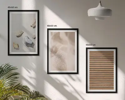 Three-piece wall art set with stones wood and fabric textures