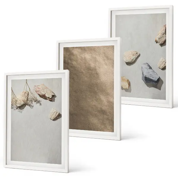 Three-piece beach stone wall art natural structures