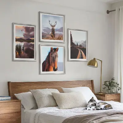 Set of 4 mountain landscape wall art prints featuring reindeer, horses, and road scenes