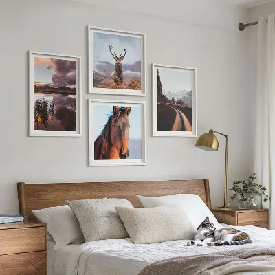 Set of 4 mountain landscape wall art prints featuring reindeer, horses, and road scenes