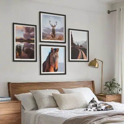 Set of 4 mountain landscape wall art prints featuring reindeer, horses, and road scenes