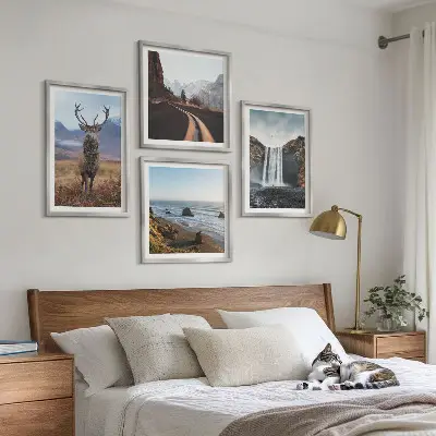 Wall art set featuring mountain landscapes with waterfalls, deer, and beaches