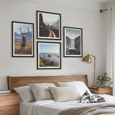 Wall art set featuring mountain landscapes with waterfalls, deer, and beaches