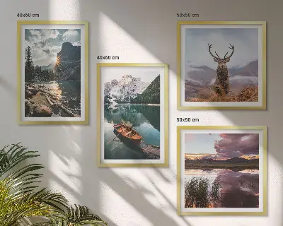 Wall art set featuring a mountain lake boat sunset and deer