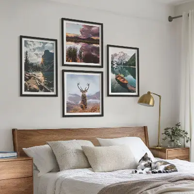 Wall art set featuring a mountain lake boat sunset and deer