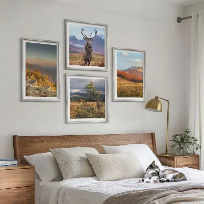 Multi-piece wall decor set featuring mountain landscapes with deer and grass