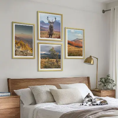 Multi-piece wall decor set featuring mountain landscapes with deer and grass
