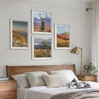 Multi-piece wall decor set featuring mountain landscapes with deer and grass