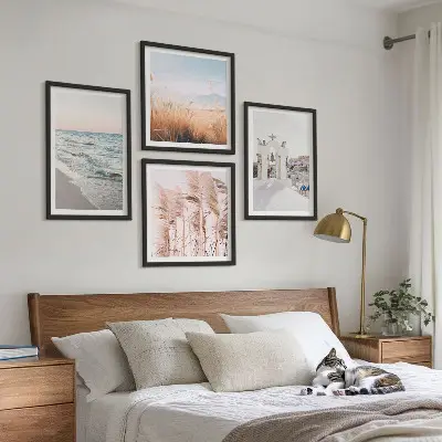 Wall art set featuring plants, sea waves, and houses