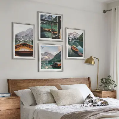 Set of 4 wall art pieces featuring lake, mountains, boats, and cottage window scenery