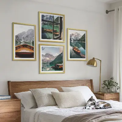 Set of 4 wall art pieces featuring lake, mountains, boats, and cottage window scenery