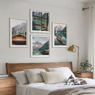 Set of 4 wall art pieces featuring lake, mountains, boats, and cottage window scenery