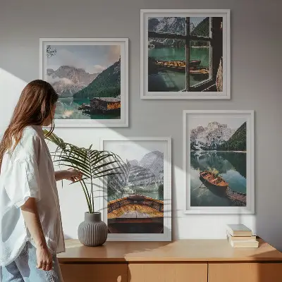 Set of 4 wall art pieces featuring lake, mountains, boats, and cottage window scenery