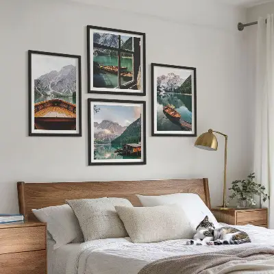 Set of 4 wall art pieces featuring lake, mountains, boats, and cottage window scenery