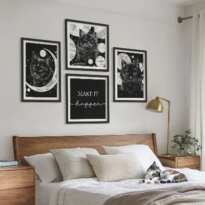 Wall art set featuring black cats, a moon, and a planet