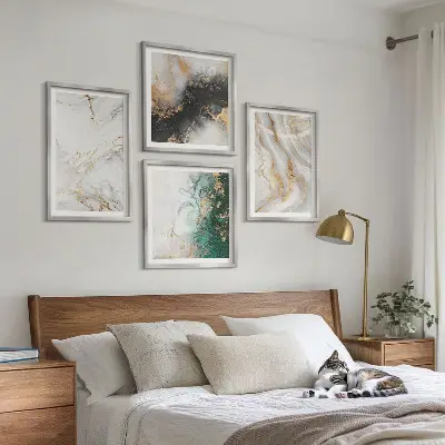 Multi-piece wall decor set with abstract patterns in white black and green