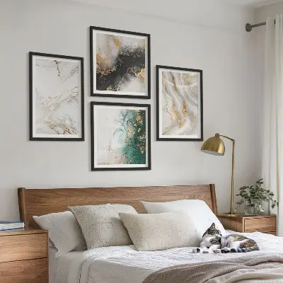 Multi-piece wall decor set with abstract patterns in white black and green