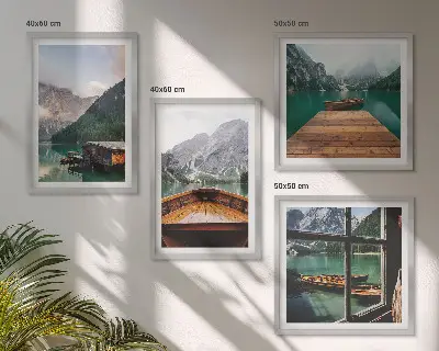 Multi-piece wall decor set featuring mountain landscapes, cottages, and boats