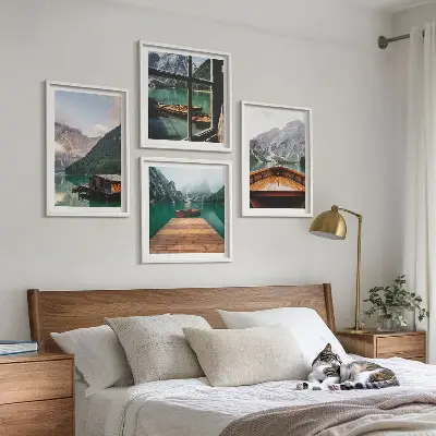 Multi-piece wall decor set featuring mountain landscapes, cottages, and boats
