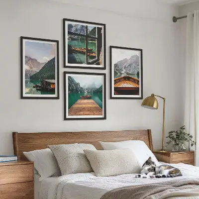 Multi-piece wall decor set featuring mountain landscapes, cottages, and boats