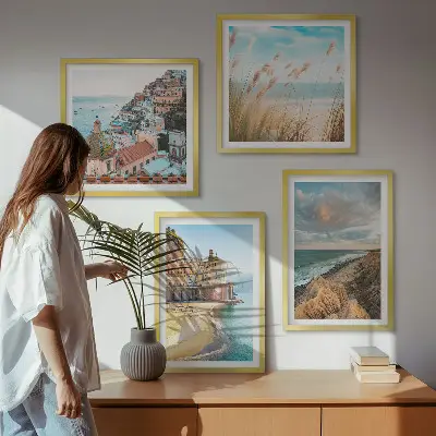 Set of 4 wall art pieces featuring landscape scenes of beaches, cities, and cliffs