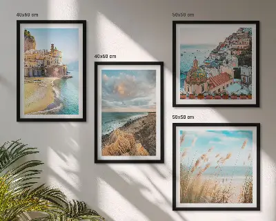 Set of 4 wall art pieces featuring landscape scenes of beaches, cities, and cliffs
