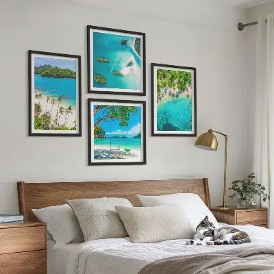 Set of four beach themed wall art pieces featuring palm trees and crystal water