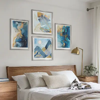 Multi-piece wall decor set with blue mountains and gold patterns
